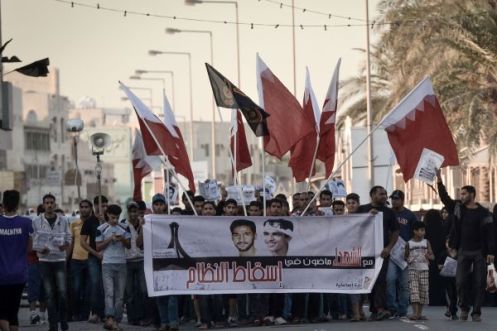 #Bahrain,#Manama,Bahraini Shia Muslim protesters demonstrate in solidarity with #political prisoners and against the government in the village of #Malikiya, south of Manama, on December 4, 2012.